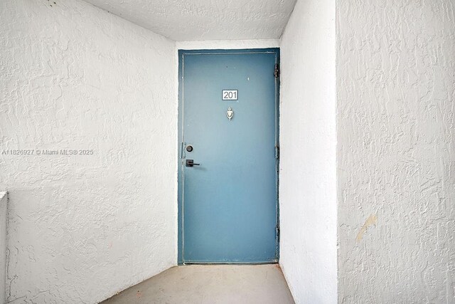 8365 SW 152nd Ave Unit C-201, Miami, FL 33193 - property entrance with stucco siding