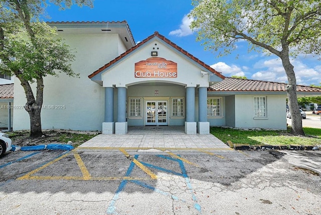 8365 SW 152nd Ave Unit C-201, Miami, FL 33193 - view of building exterior with uncovered parking
