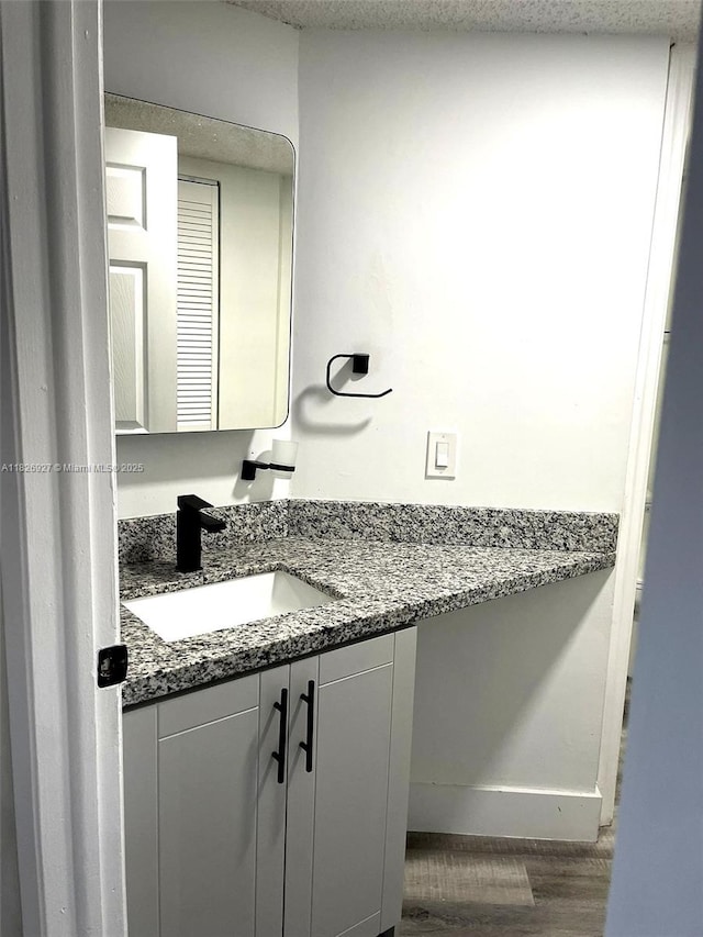 8365 SW 152nd Ave Unit C-201, Miami, FL 33193 - bathroom featuring vanity and wood finished floors