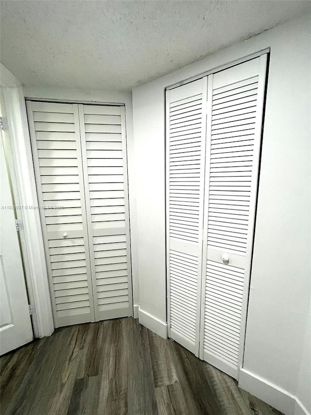 8365 SW 152nd Ave Unit C-201, Miami, FL 33193 - detailed view of wood finished floors and a textured ceiling