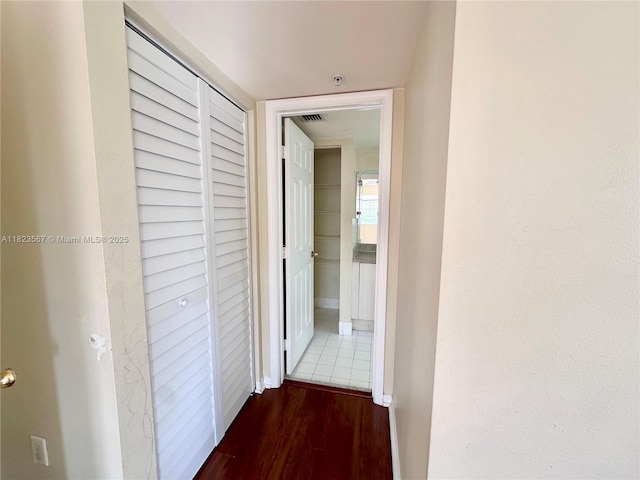 11185 SW 6th St Unit 303, Pembroke Pines, FL 33025 - hall with dark wood-style flooring and baseboards