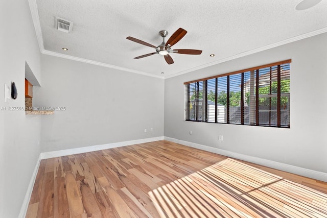 20155 E Oakmont Cir, Hialeah, FL 33015 - empty room featuring ceiling fan, wood finished floors, a textured ceiling, and crown molding