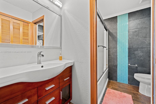 20155 E Oakmont Cir, Hialeah, FL 33015 - full bathroom with wood finished floors, vanity, and combined bath / shower with glass door