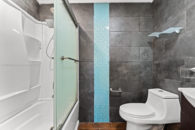 20155 E Oakmont Cir, Hialeah, FL 33015 - full bathroom with tile walls and combined bath / shower with glass door