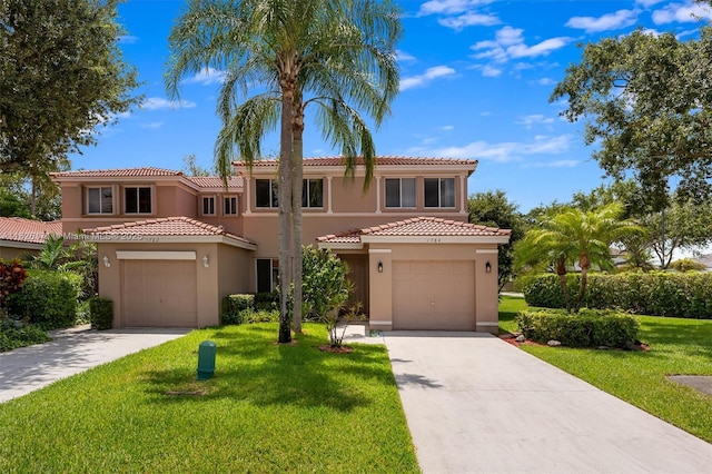 1784 SW 110th Ter, Davie, FL 33324 - mediterranean / spanish-style house with stucco siding, a front yard, driveway, and a tile roof