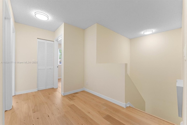 1784 SW 110th Ter, Davie, FL 33324 - hallway featuring wood finished floors and a textured ceiling