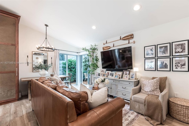 13765 SW 147th Cir Ln Unit 2-24, Miami, FL 33186 - living room with light wood-style flooring, a chandelier, vaulted ceiling, and recessed lighting