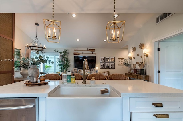 13765 SW 147th Cir Ln Unit 2-24, Miami, FL 33186 - kitchen with a chandelier, open floor plan, light countertops, decorative light fixtures, and vaulted ceiling