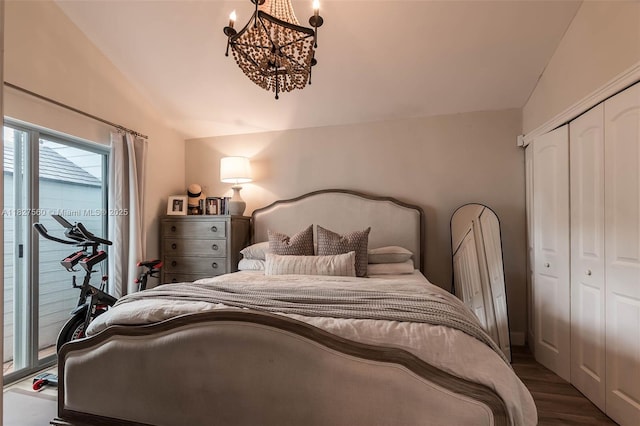 13765 SW 147th Cir Ln Unit 2-24, Miami, FL 33186 - bedroom with lofted ceiling, access to outside, a chandelier, wood finished floors, and a closet