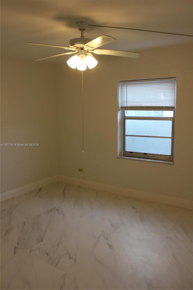 971 E 18th St, Hialeah, FL 33013 - empty room featuring marble finish flooring and ceiling fan