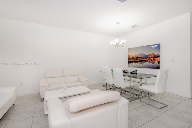 10628 W 33rd Way, Hialeah, FL 33018 - living area with a chandelier and light tile patterned floors