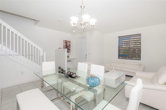 10628 W 33rd Way, Hialeah, FL 33018 - dining room featuring a chandelier, stairs, and light tile patterned floors