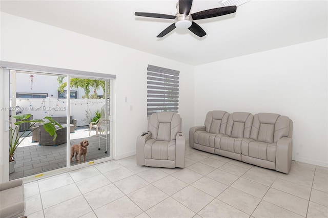10628 W 33rd Way, Hialeah, FL 33018 - living room featuring light tile patterned flooring and ceiling fan