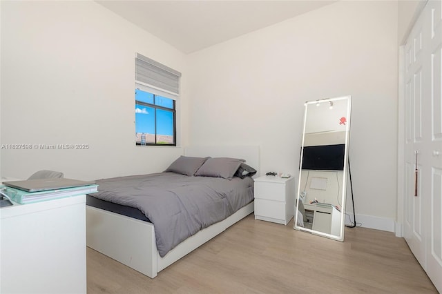 10628 W 33rd Way, Hialeah, FL 33018 - bedroom with light wood-style floors