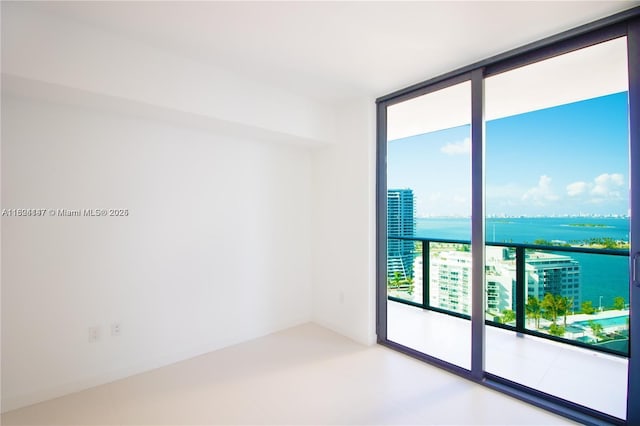 501 NE 31st St Unit 2005, Miami, FL 33137 - spare room featuring a water view and expansive windows