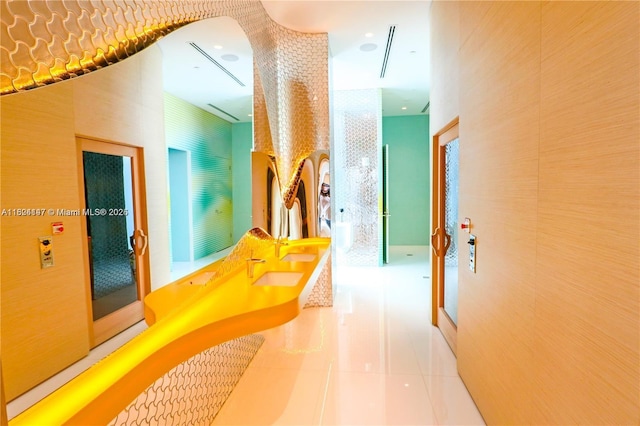 501 NE 31st St Unit 2005, Miami, FL 33137 - hallway featuring tile patterned flooring and arched walkways