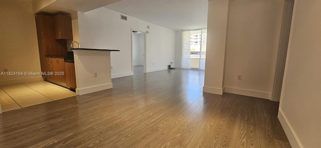 2775 NE 187th St Unit 424, Aventura, FL 33180 - empty room featuring wood finished floors and baseboards