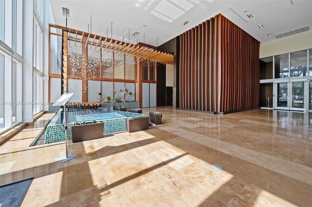 50 Biscayne Blvd Unit 3605, Miami, FL 33132 - building lobby featuring a high ceiling