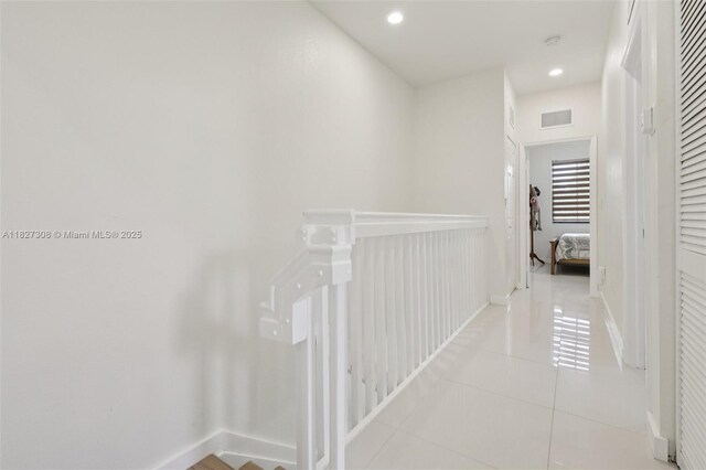 9349 W 33rd Way, Hialeah, FL 33018 - hall featuring tile patterned flooring, an upstairs landing, and recessed lighting