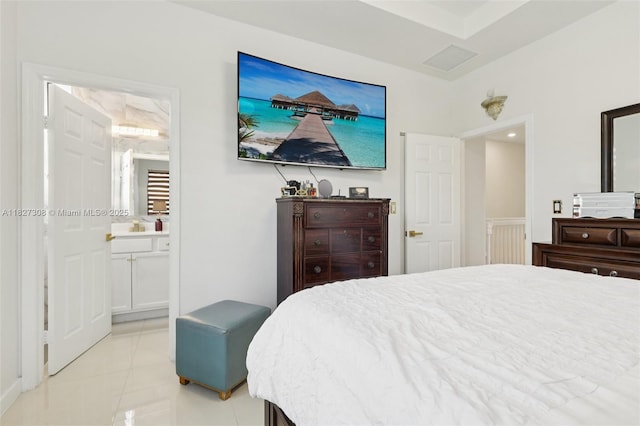 9349 W 33rd Way, Hialeah, FL 33018 - bedroom featuring light tile patterned floors and ensuite bathroom