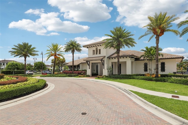 9349 W 33rd Way, Hialeah, FL 33018 - view of front of property featuring curved driveway, stucco siding, and a tiled roof