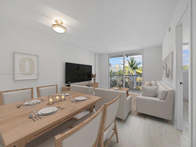 401 Ocean Dr Unit 403, Miami Beach, FL 33139 - dining area with light wood-style flooring