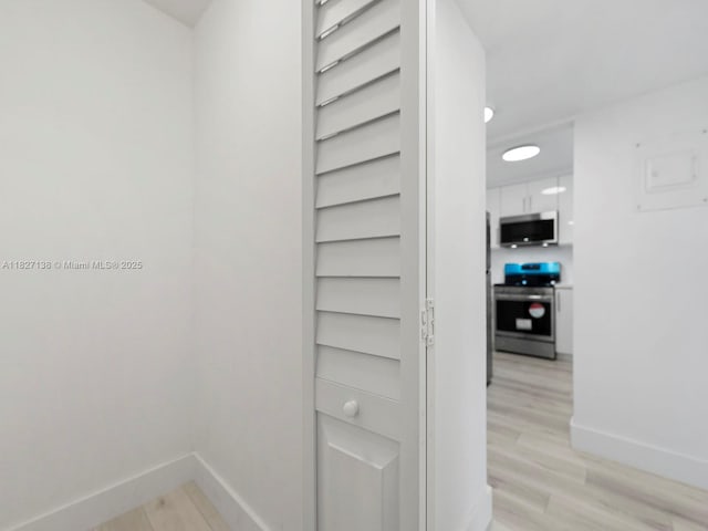 401 Ocean Dr Unit 403, Miami Beach, FL 33139 - detailed view of appliances with stainless steel finishes and wood finished floors