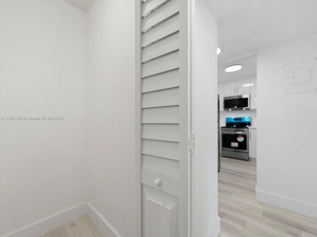 401 Ocean Dr Unit 403, Miami Beach, FL 33139 - detailed view of appliances with stainless steel finishes and wood finished floors