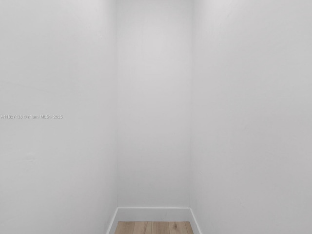 401 Ocean Dr Unit 403, Miami Beach, FL 33139 - spare room with baseboards and light wood-style flooring