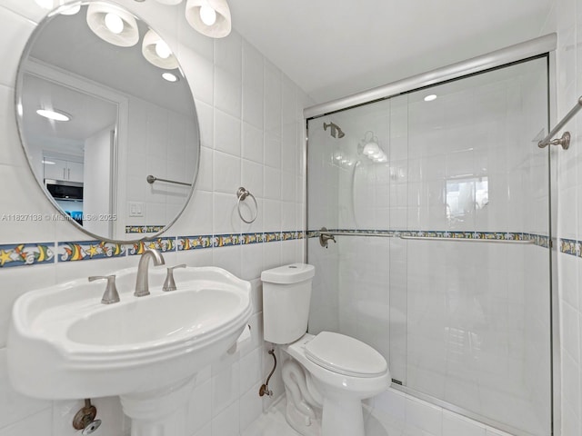 401 Ocean Dr Unit 403, Miami Beach, FL 33139 - full bathroom with tile walls and a stall shower