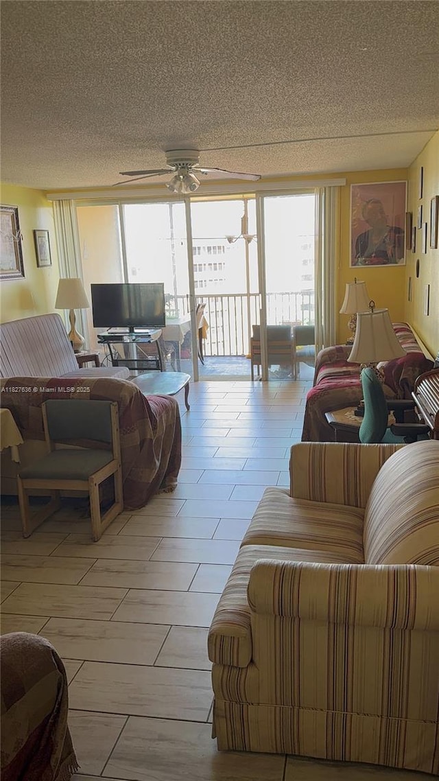 1750 NE 191st St Unit 804-1, Miami, FL 33179 - living room featuring a ceiling fan and a textured ceiling