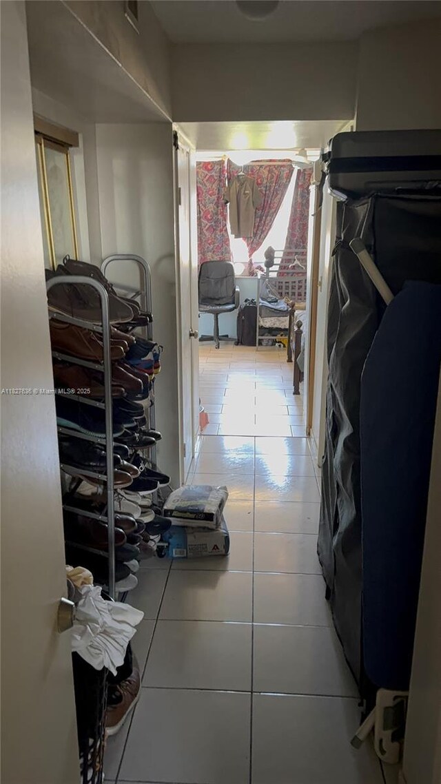 1750 NE 191st St Unit 804-1, Miami, FL 33179 - hall with light tile patterned floors