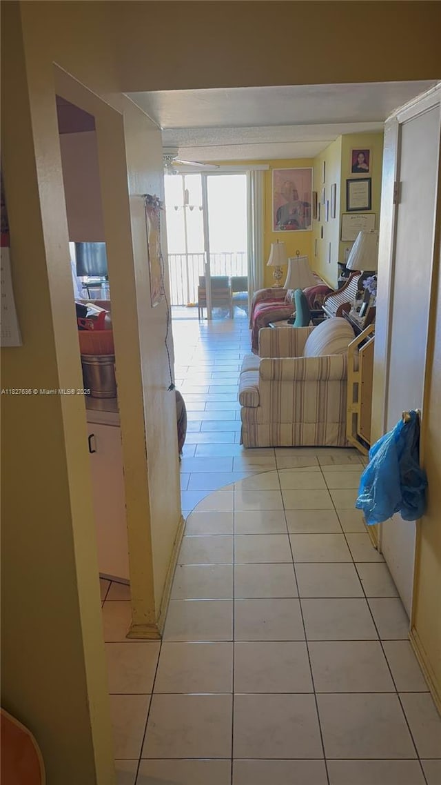 1750 NE 191st St Unit 804-1, Miami, FL 33179 - hallway with light tile patterned flooring