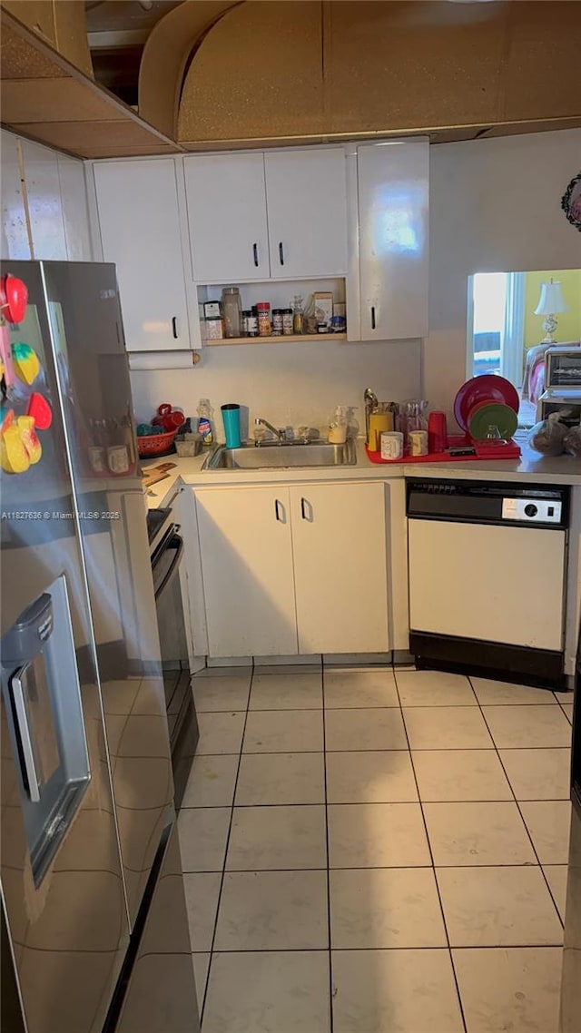 1750 NE 191st St Unit 804-1, Miami, FL 33179 - kitchen featuring white dishwasher, stainless steel refrigerator with ice dispenser, stove, light countertops, and white cabinets