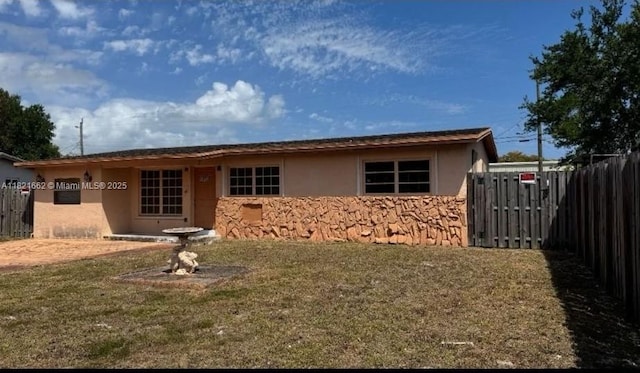 1012 SW 22nd Ave, Fort Lauderdale, FL 33312 - rear view of house with stucco siding