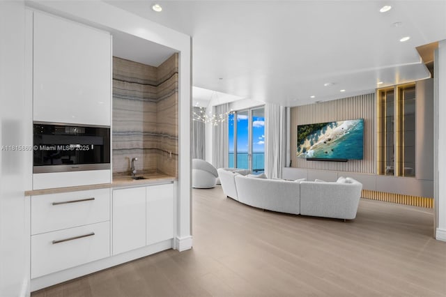 17901 Collins Ave Unit 1607, Sunny Isles Beach, FL 33160 - living room featuring wood finished floors and recessed lighting