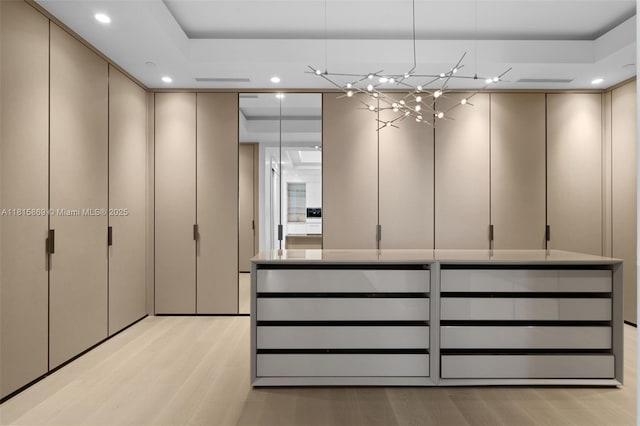 17901 Collins Ave Unit 1607, Sunny Isles Beach, FL 33160 - spacious closet with light wood-type flooring and a chandelier