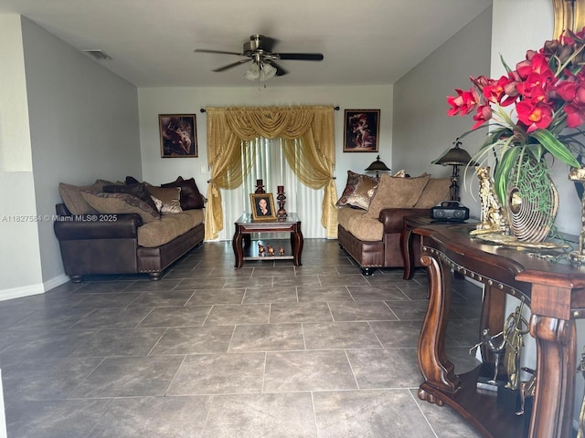 1046 Bayberry Loop, Clewiston, FL 33440 - living area with ceiling fan and baseboards