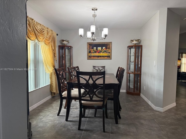 1046 Bayberry Loop, Clewiston, FL 33440 - dining space with a chandelier and baseboards