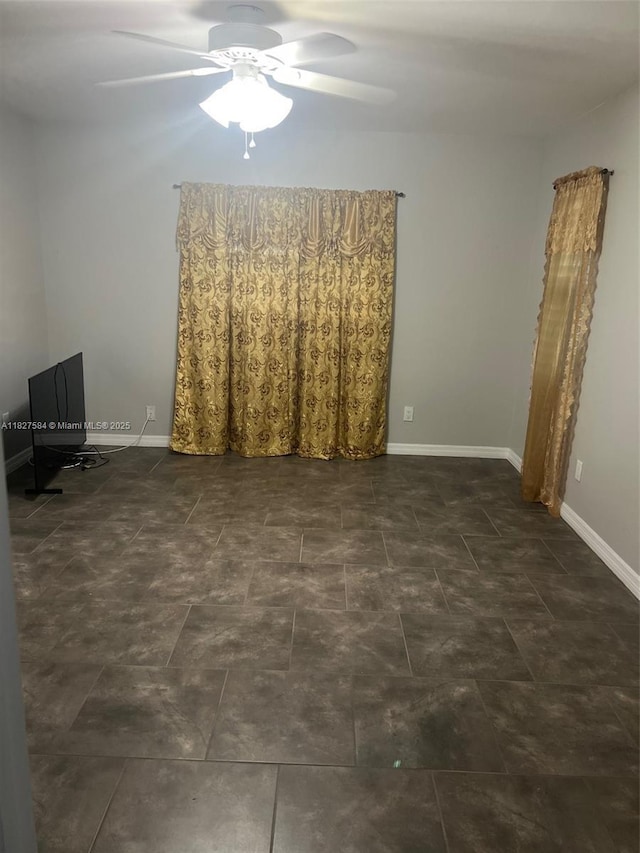 1046 Bayberry Loop, Clewiston, FL 33440 - unfurnished room featuring a ceiling fan and baseboards