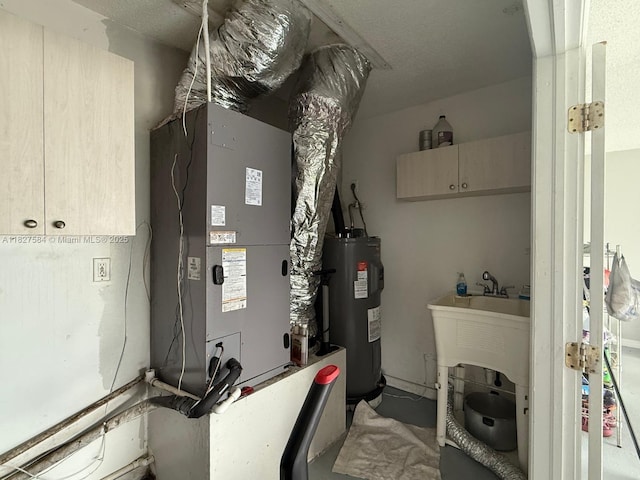 1046 Bayberry Loop, Clewiston, FL 33440 - utility room with water heater and heating unit