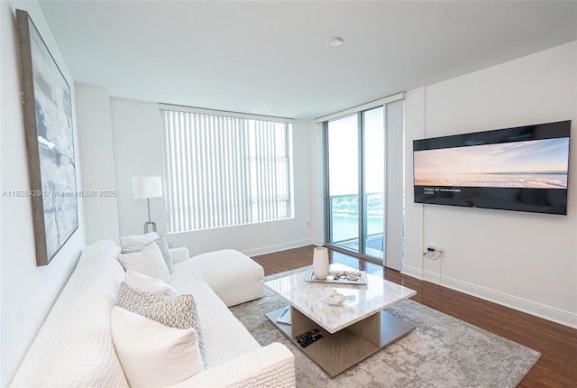 2641 N Flamingo Rd Unit 1603N, Sunrise, FL 33323 - living area with dark wood-type flooring and baseboards