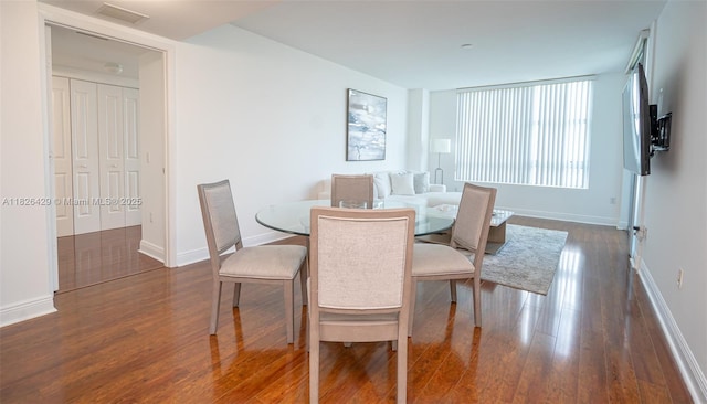 2641 N Flamingo Rd Unit 1603N, Sunrise, FL 33323 - dining area featuring dark wood-type flooring and baseboards