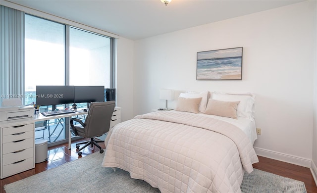 2641 N Flamingo Rd Unit 1603N, Sunrise, FL 33323 - bedroom with dark wood-style floors and an office area