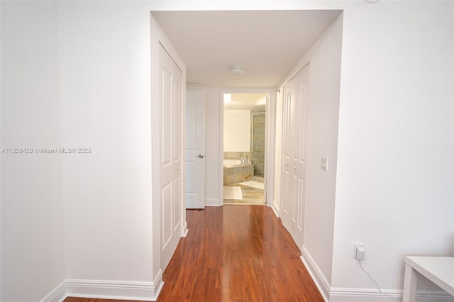 2641 N Flamingo Rd Unit 1603N, Sunrise, FL 33323 - corridor featuring wood finished floors and baseboards
