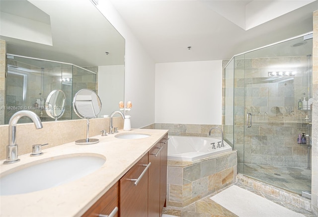 2641 N Flamingo Rd Unit 1603N, Sunrise, FL 33323 - bathroom featuring a bath, double vanity, and a shower stall
