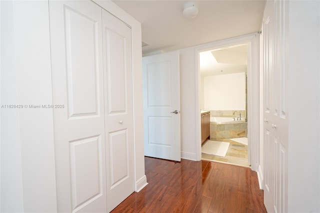 2641 N Flamingo Rd Unit 1603N, Sunrise, FL 33323 - hall featuring dark wood-type flooring and baseboards