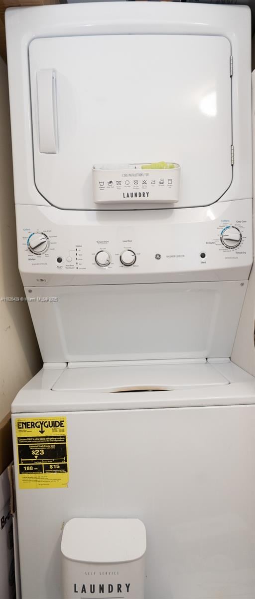 2641 N Flamingo Rd Unit 1603N, Sunrise, FL 33323 - laundry room featuring estacked washer and dryer