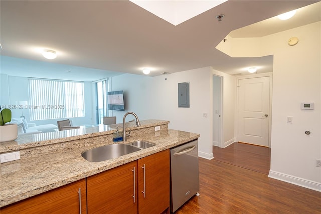 2641 N Flamingo Rd Unit 1603N, Sunrise, FL 33323 - kitchen featuring stainless steel dishwasher, brown cabinets, electric panel, dark wood finished floors, and light stone countertops
