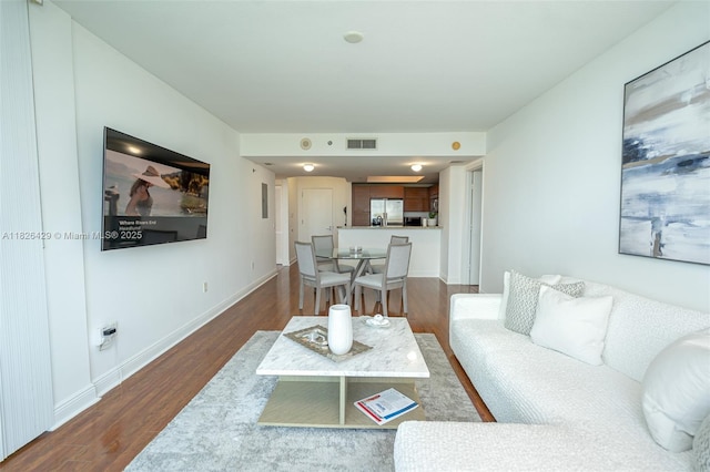 2641 N Flamingo Rd Unit 1603N, Sunrise, FL 33323 - living area with dark wood finished floors and baseboards